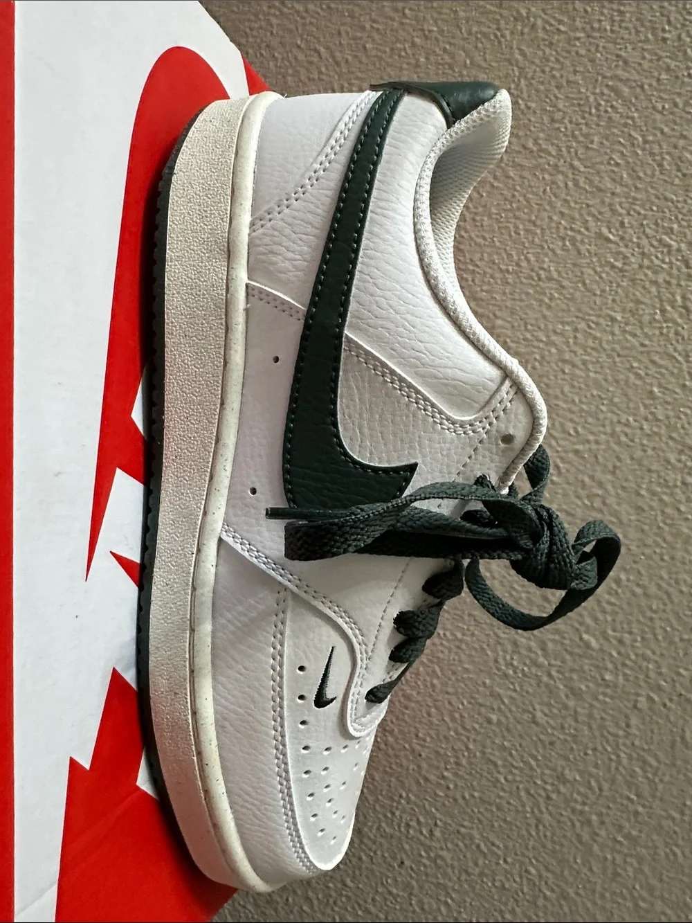 Nike White Low-Top Sneakers with Dark Green Swoosh and Heel